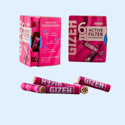 Lifestyle Shot GIZEH All Pink 34er Box im Setup – Aktivkohlefilter im Vorratspack für saubere Sessions & stylischen Geschmack